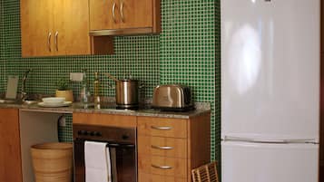 Standard Apartment, 2 Bedrooms, Balcony | Private kitchen | Fridge, microwave, coffee/tea maker, electric kettle