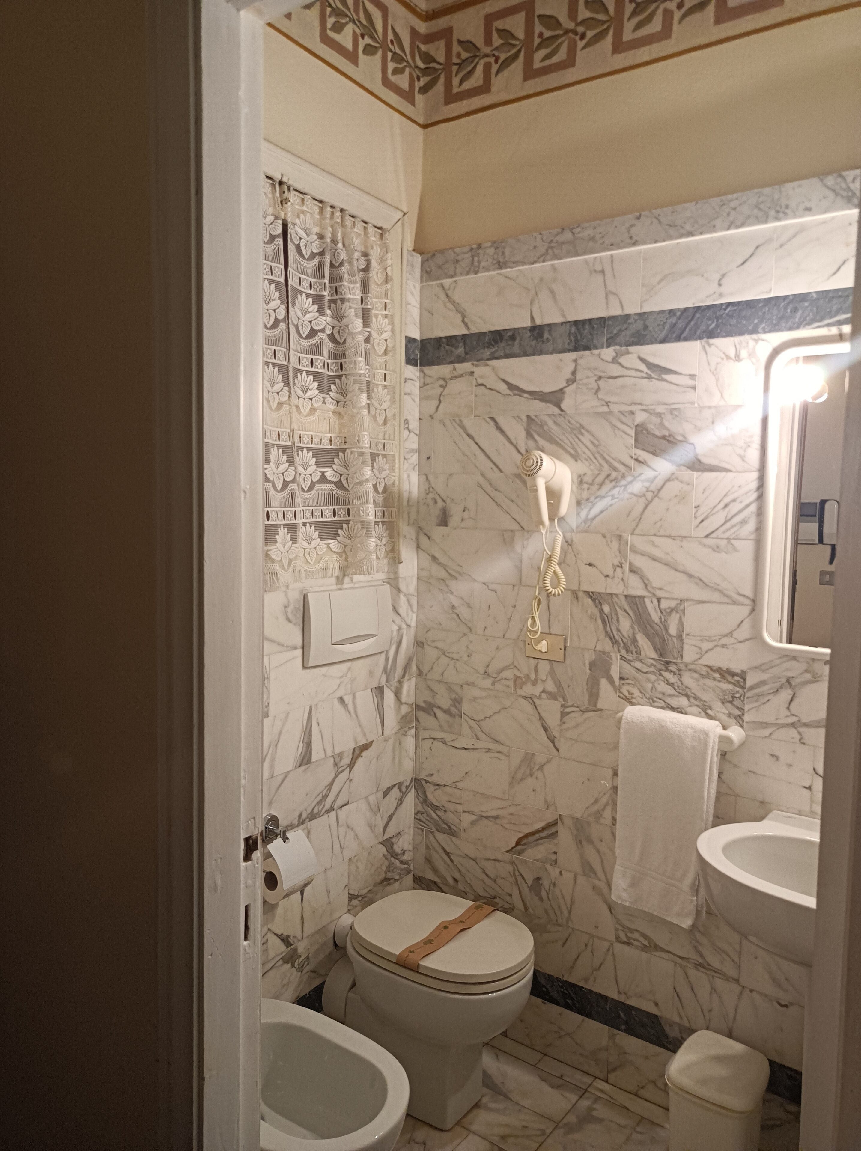 economy double room (beach access not included) | bathroom | hair dryer, slippers, bidet, towels