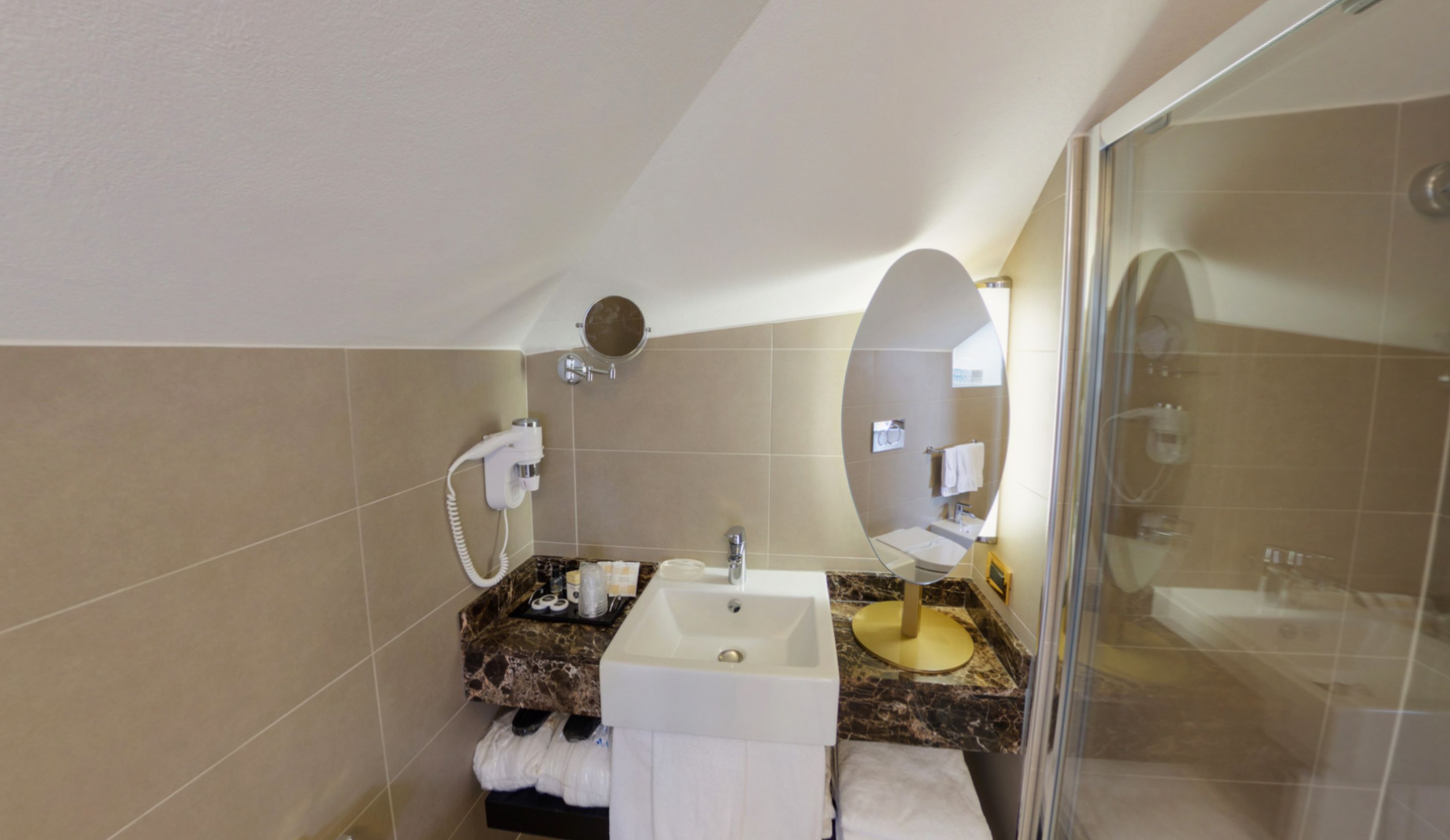 royal studio suite (beach access included) | bathroom | hair dryer, slippers, bidet, towels