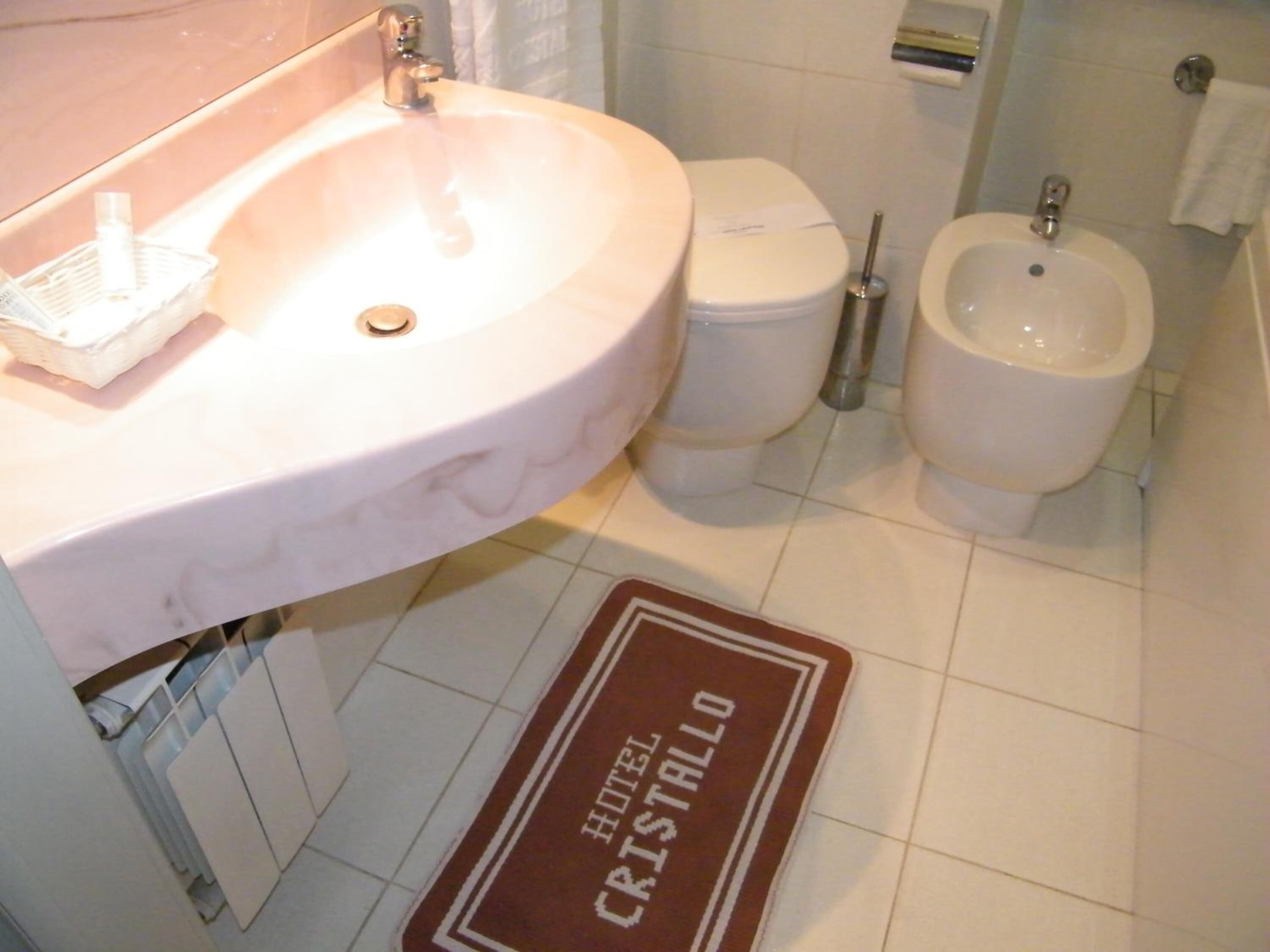 free toiletries, hair dryer, bidet, towels