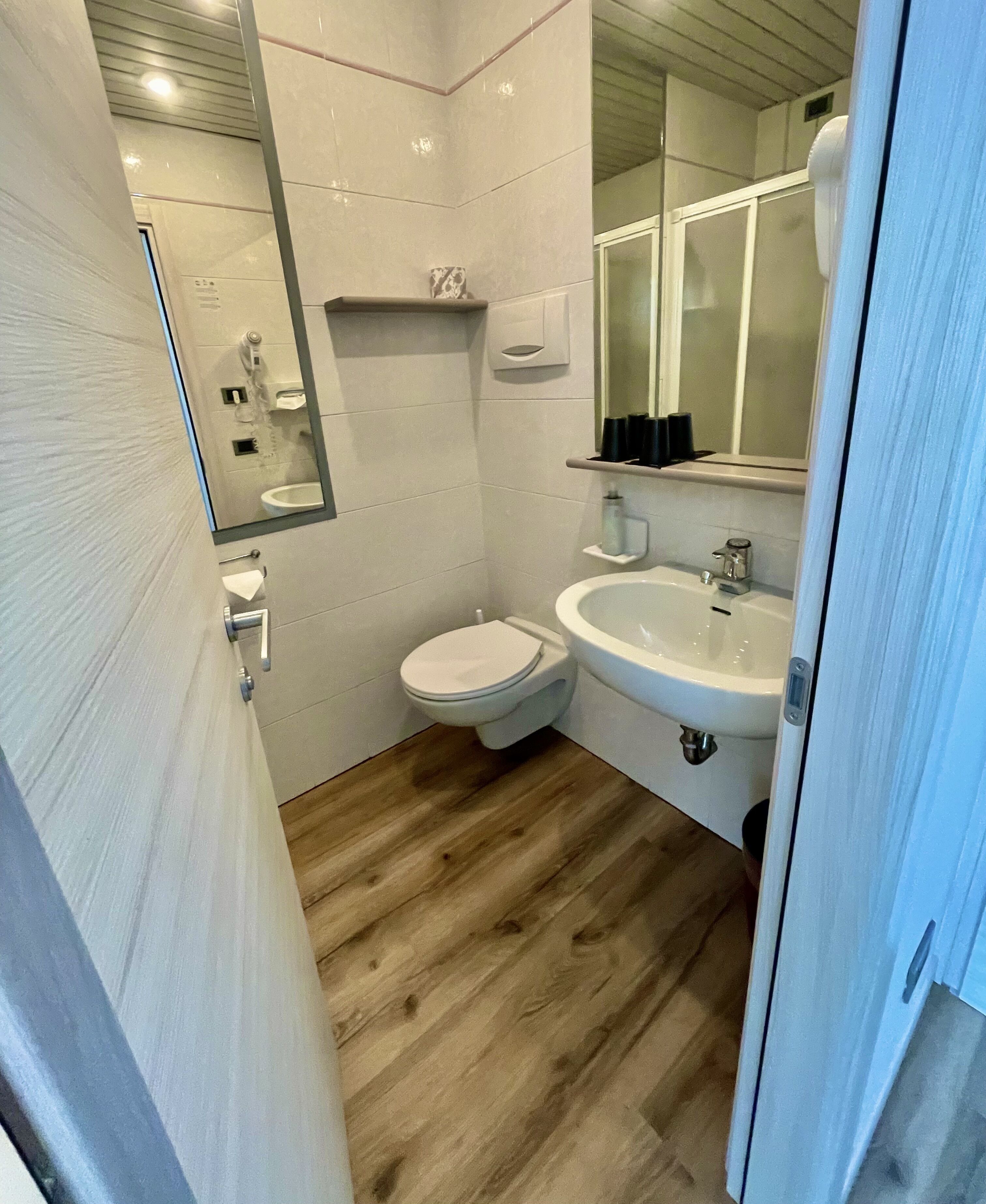 standard double room | bathroom | shower, designer toiletries, hair dryer, towels