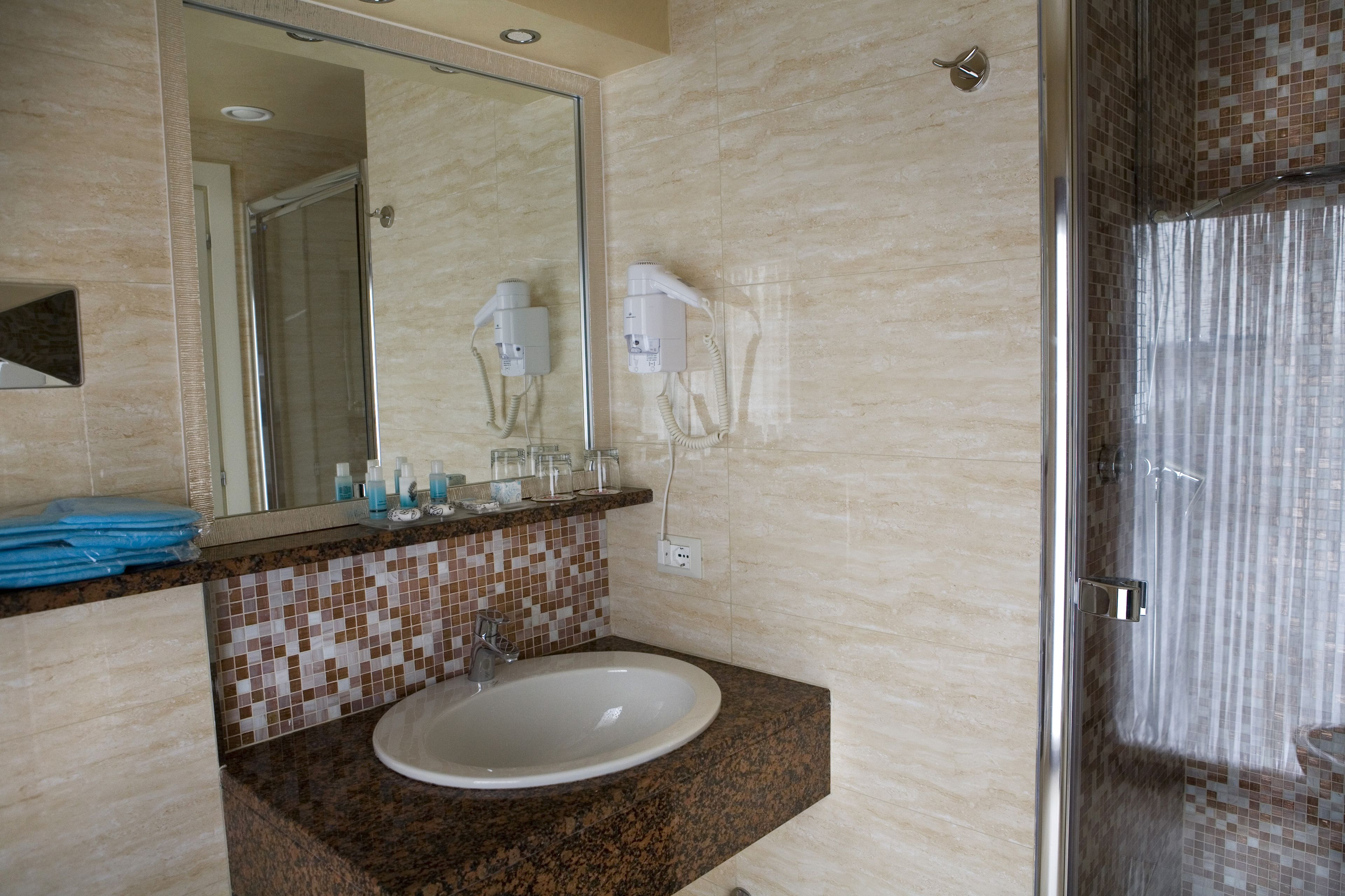 shower, free toiletries, hair dryer, slippers