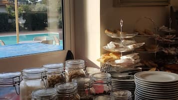 Daily buffet breakfast (EUR 7 per person)