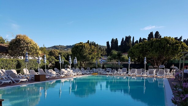 Seasonal outdoor pool, pool umbrellas, pool loungers