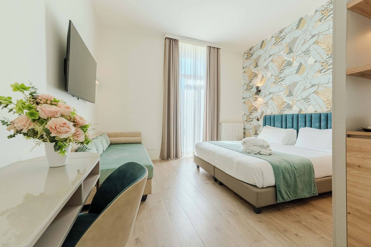 Comfort Triple Room, 1 Bedroom, Non Smoking, Partial Sea View | In-room safe, soundproofing, free WiFi, bed sheets