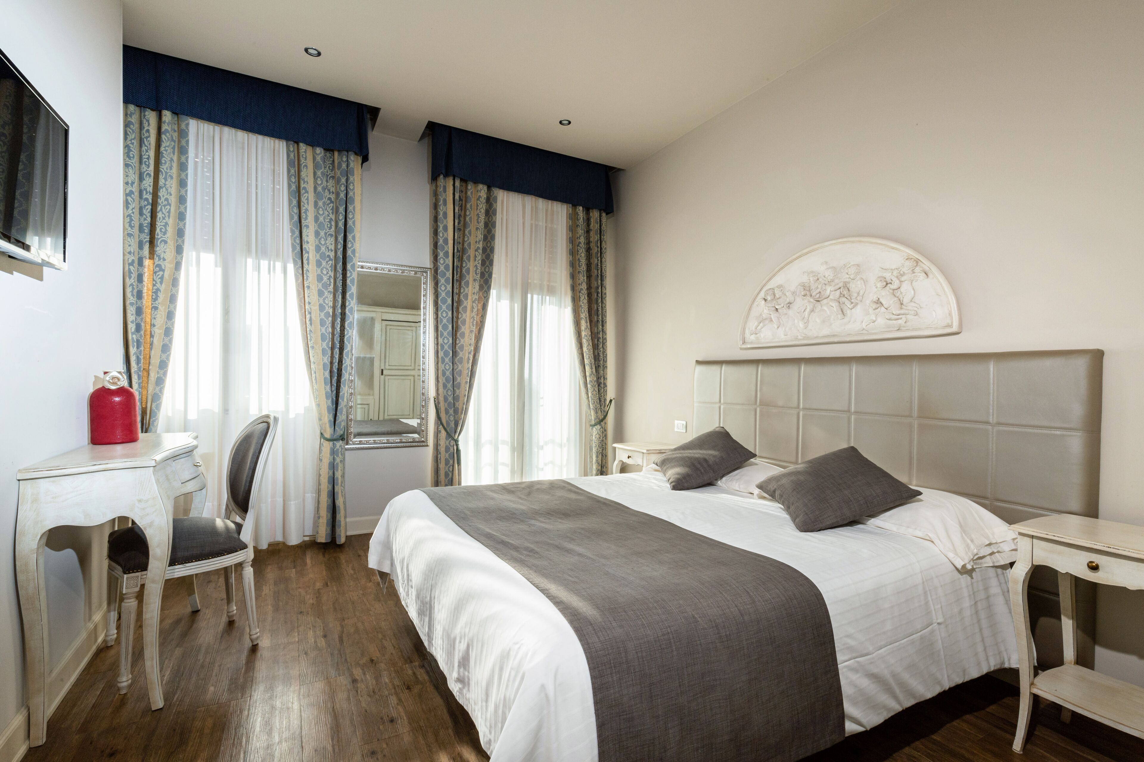 comfort double or twin room, partial lake view | in-room safe, free wifi, bed sheets