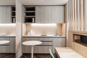 Studio Confort, 1 grand lit, cuisinette | Cuisinette privée