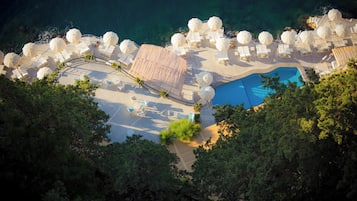Seasonal outdoor pool, pool umbrellas, pool loungers