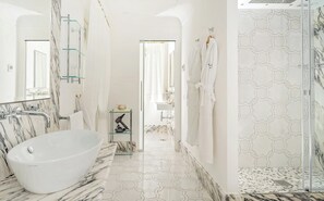 Eco-friendly toiletries, hair dryer, bathrobes, slippers