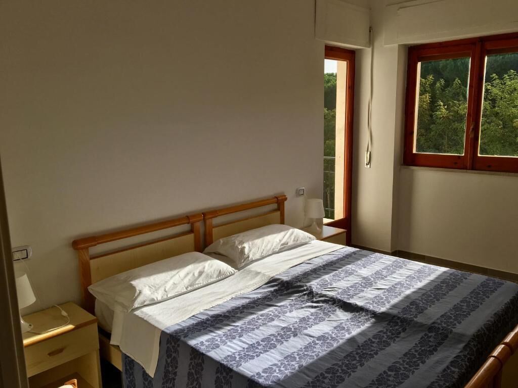 Leilighet, balkong, bakgårdsutsikt | Safe på rommet, barnesenger, wi-fi (inkludert) og sengetøy