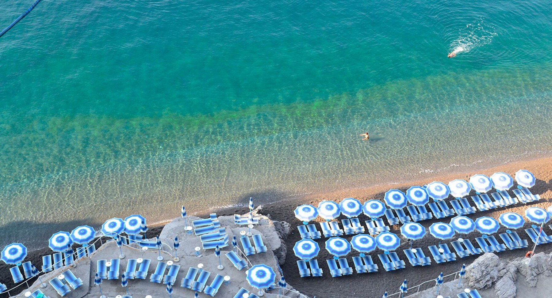 Private beach, black sand, beach bar