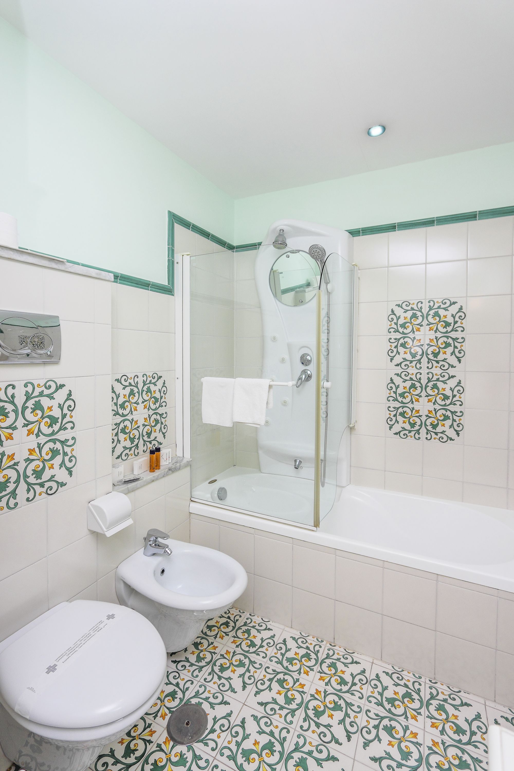 standard double or twin room | bathroom | rainfall showerhead, free toiletries, hair dryer, bidet