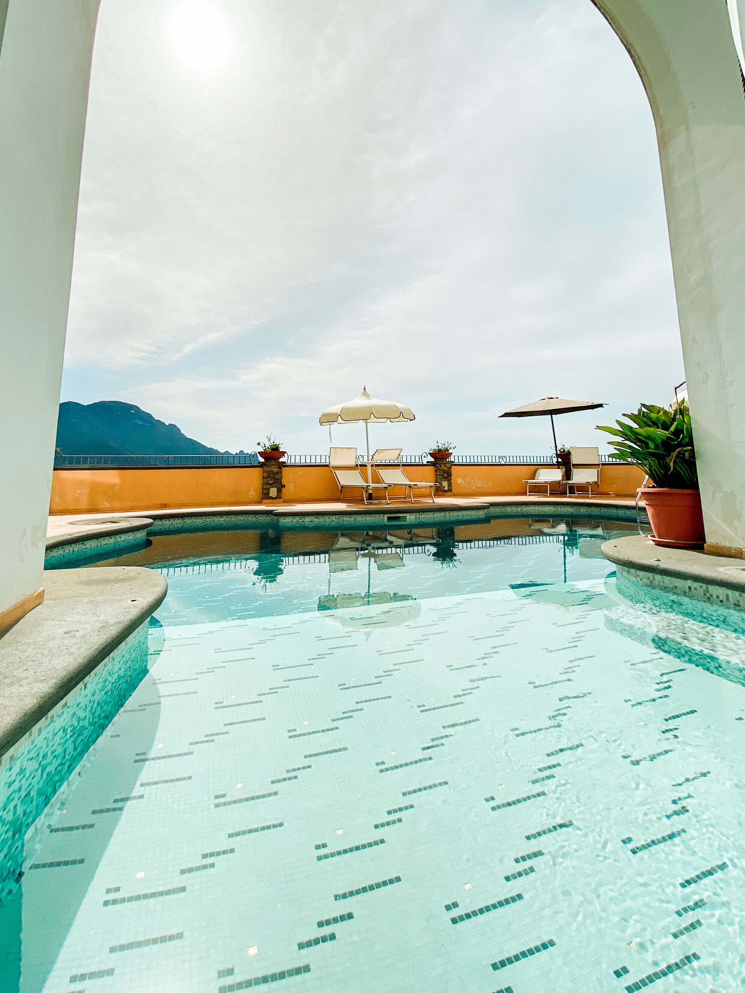 seasonal outdoor pool, open 9:00 am to 5:00 pm, pool umbrellas