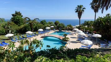 Seasonal outdoor pool, pool loungers