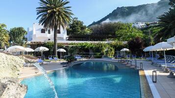 Seasonal outdoor pool, pool loungers