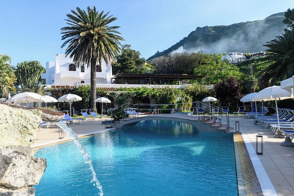 Seasonal outdoor pool, pool loungers