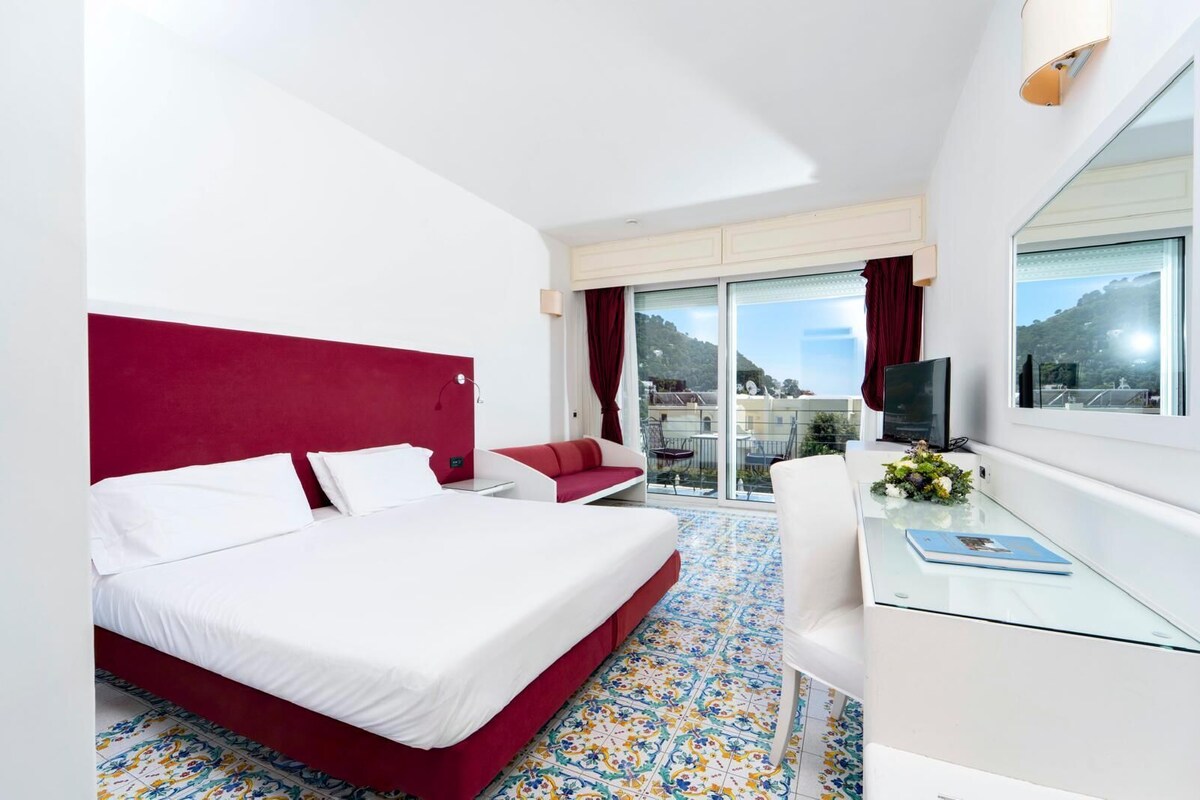 Superior Double or Twin Room, Garden View | Minibar, in-room safe, desk, laptop workspace