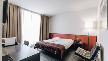 Superior Double or Twin Room | Minibar, in-room safe, desk, laptop workspace