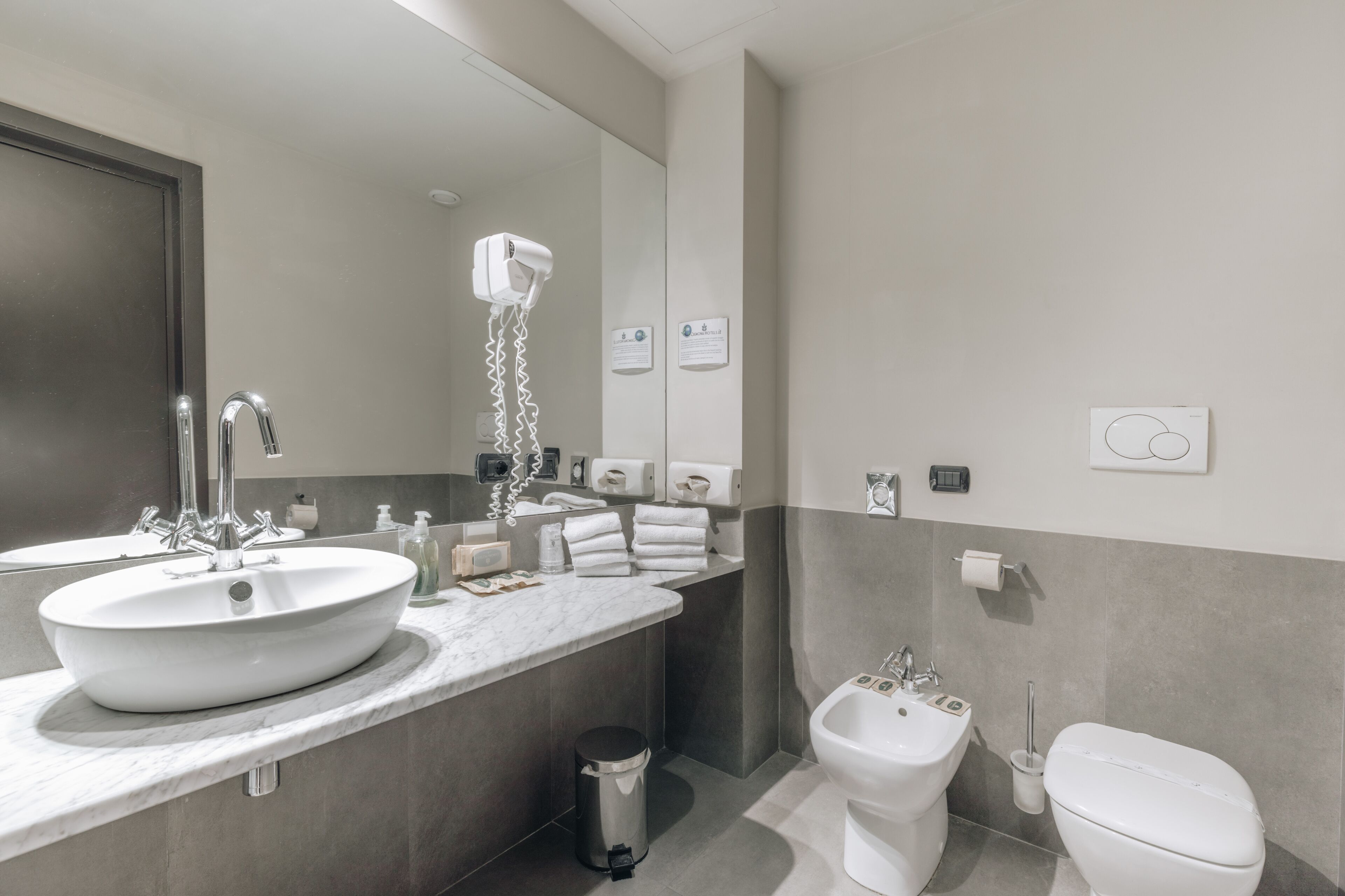 superior quadruple room | bathroom | free toiletries, hair dryer, bidet, towels