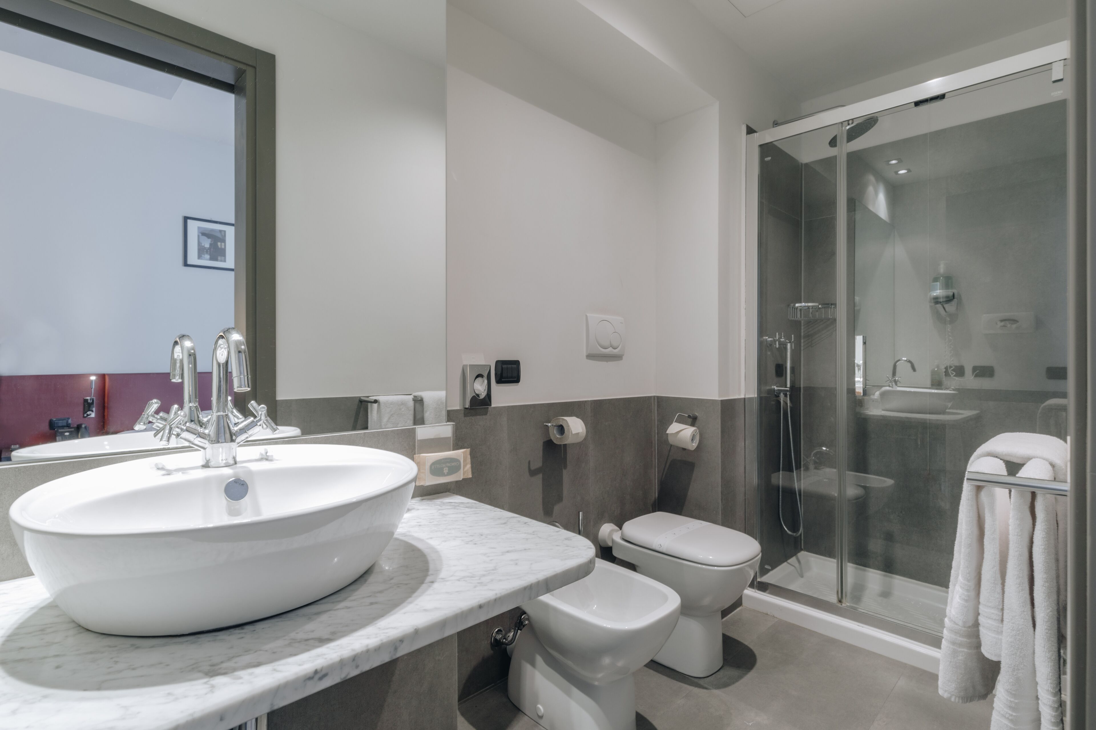 free toiletries, hair dryer, bidet, towels