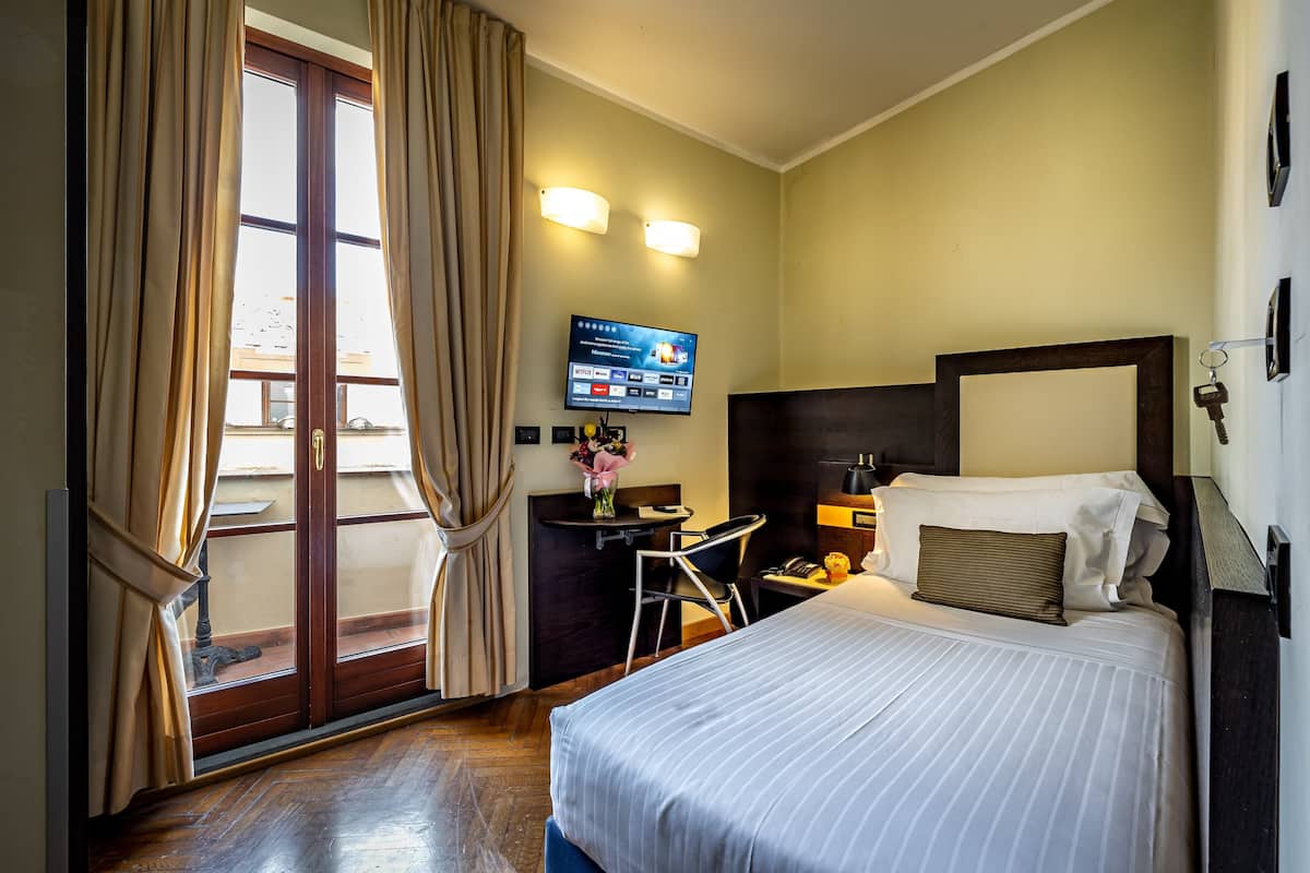 Down duvets, minibar, in-room safe, desk
