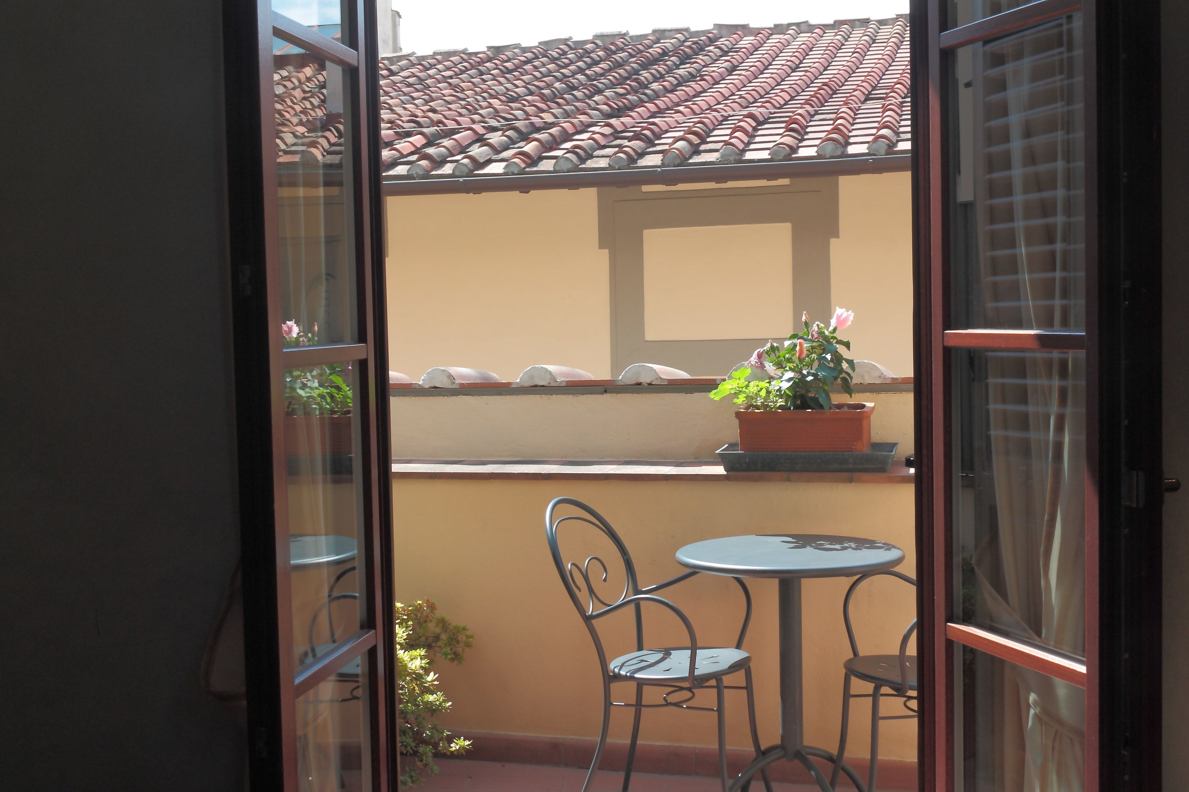 classic double room, balcony (partial duomo view) | balcony