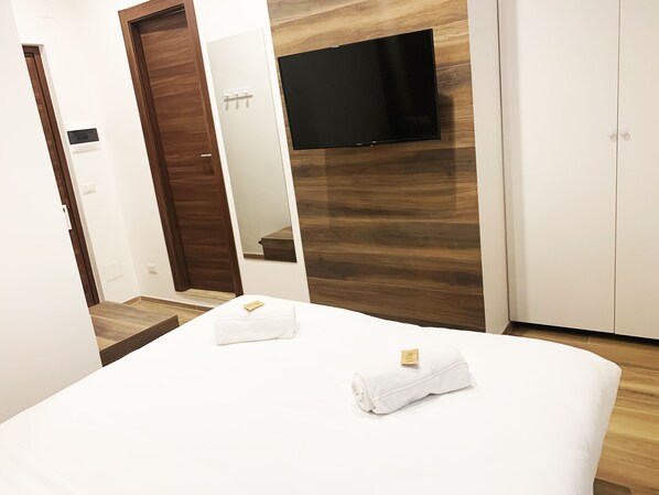 Literie de qualité supérieure, coffres-forts dans les chambres