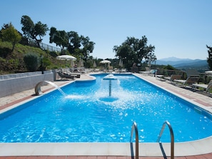 Seasonal outdoor pool, pool umbrellas, sun loungers