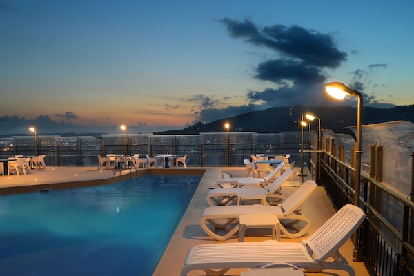 Seasonal outdoor pool, pool umbrellas, pool loungers