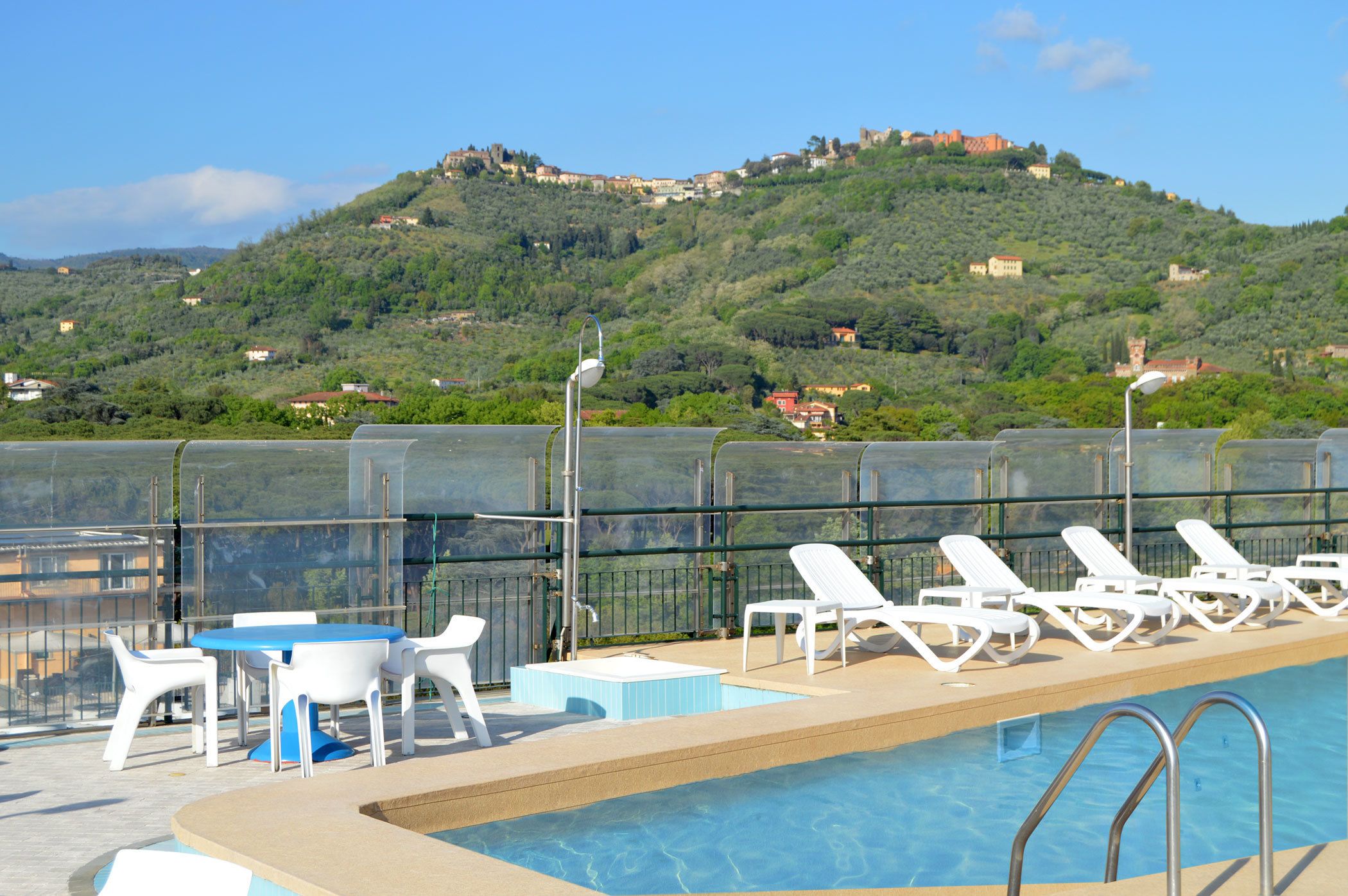 seasonal outdoor pool, pool umbrellas, pool loungers