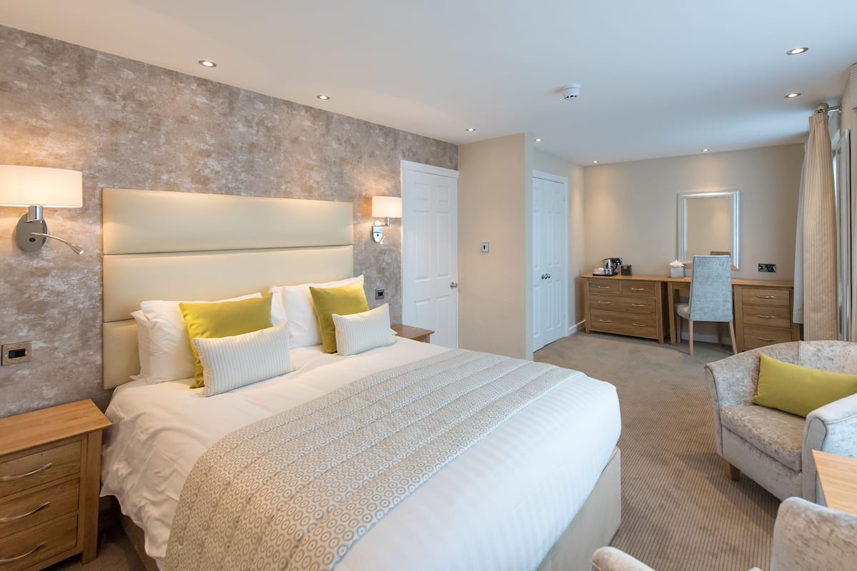 deluxe double room | in-room safe, desk, laptop workspace, iron/ironing board