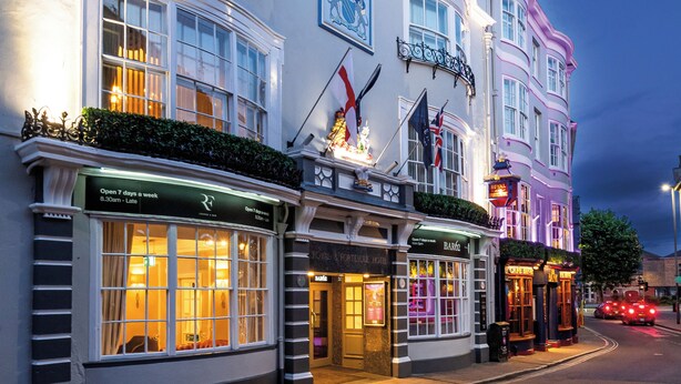 A row of historic hotels with classic architecture, including a prominent sign for the Royal & Palescure Hotel. - The Royal & Fortescue (Barnstaple)
