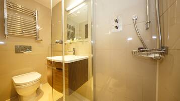 Shower, free toiletries, hair dryer, towels