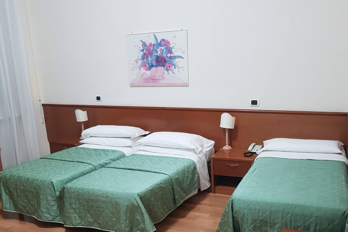 Triple Room | Desk, iron/ironing board (on request), WiFi (free), bed sheets