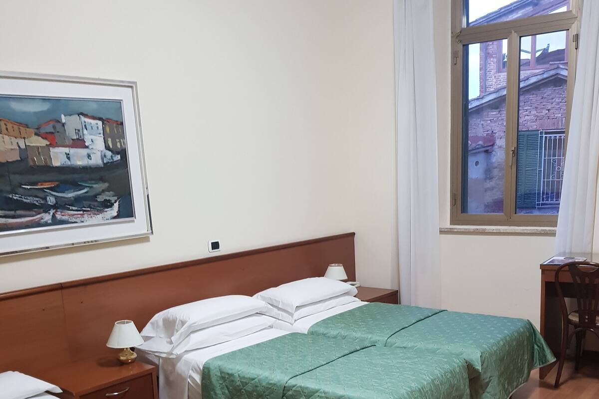 Quadruple Room | Desk, iron/ironing board (on request), WiFi (free), bed sheets