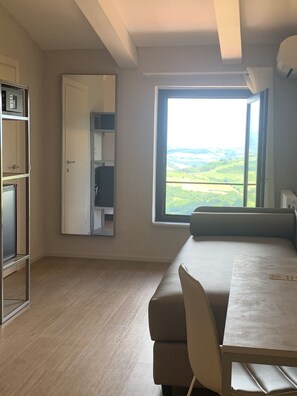 Double Room, Hill View | 1 bedroom, minibar, free WiFi, bed sheets
