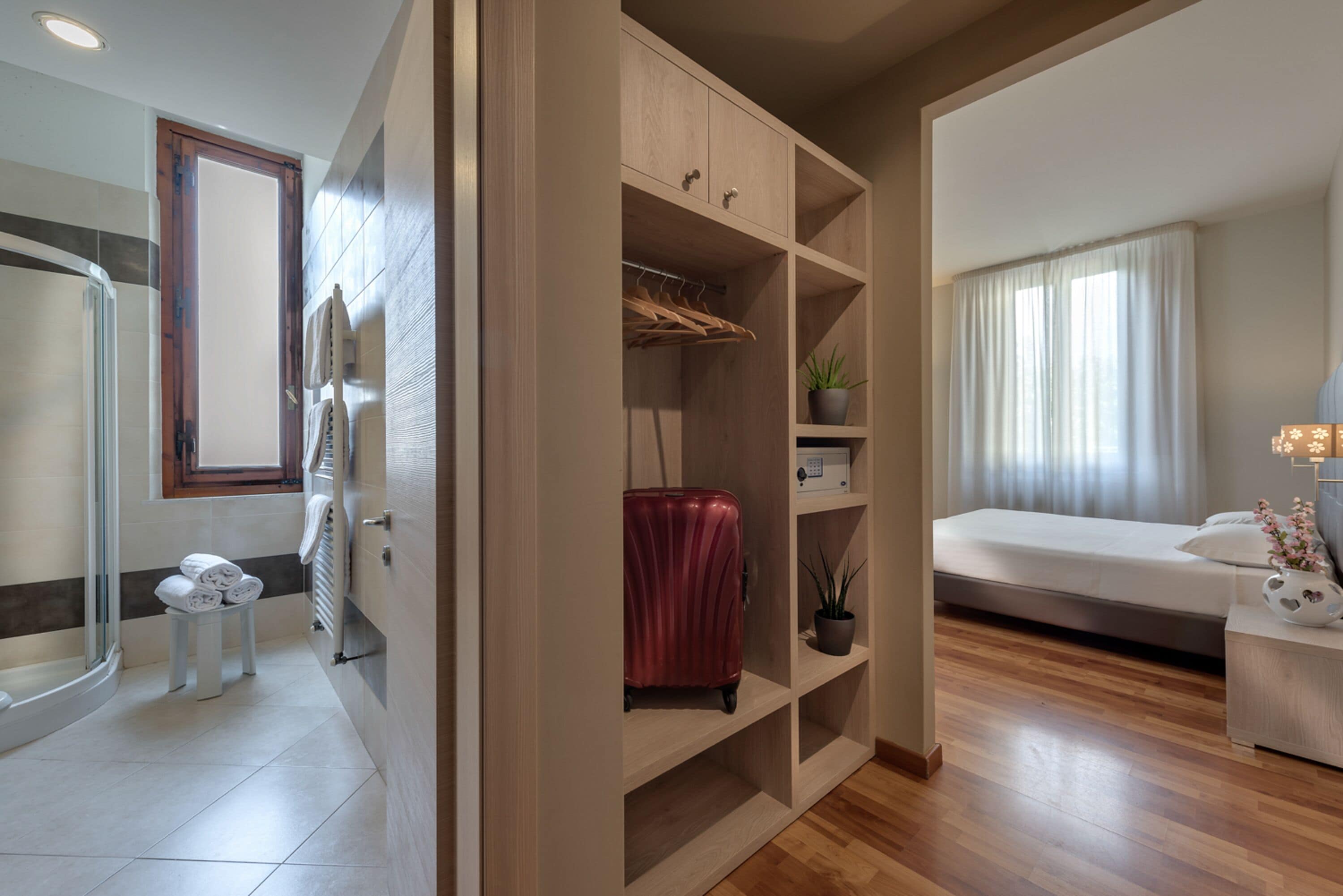 superior quadruple room | down duvets, in-room safe, desk, laptop workspace