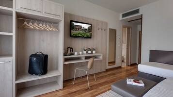 Superior Triple Room | Down comforters, in-room safe, desk, laptop workspace