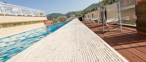 Seasonal outdoor pool, sun loungers