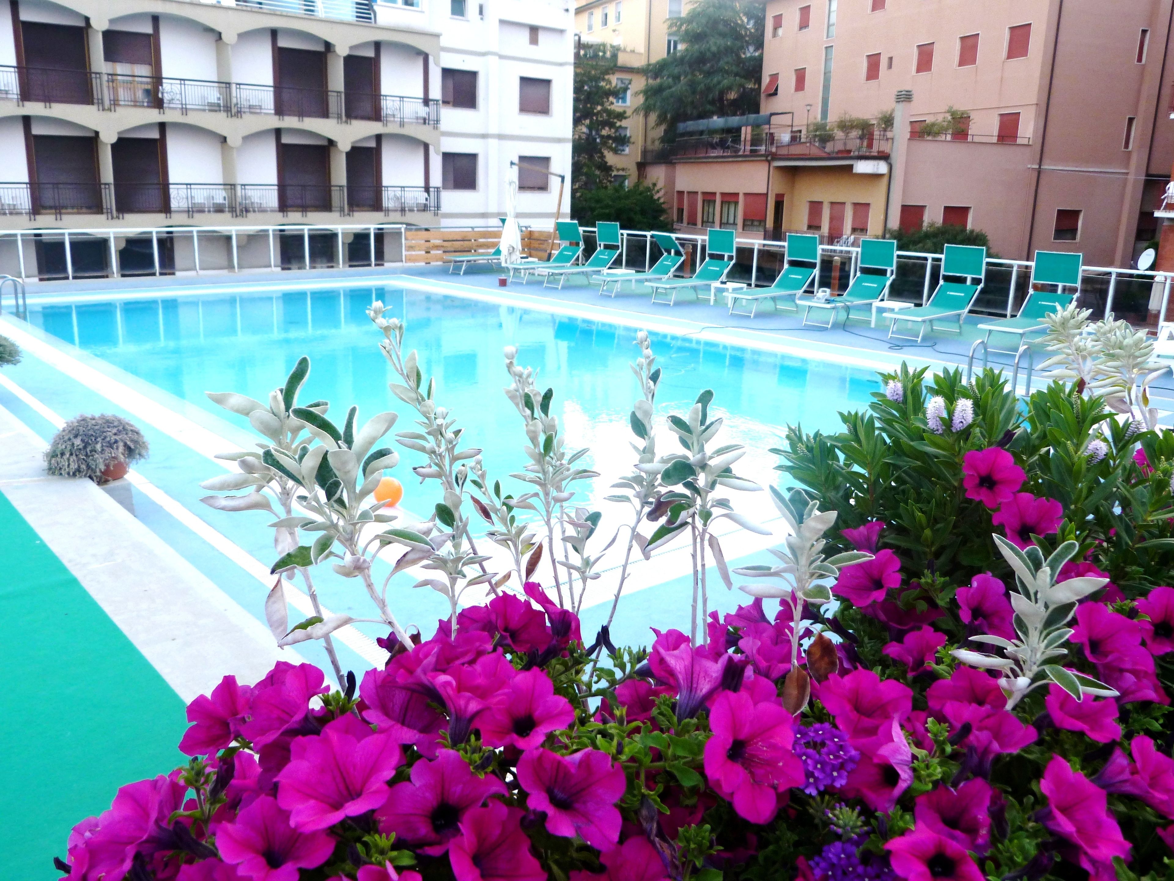 Indoor pool, seasonal outdoor pool, pool umbrellas, sun loungers
