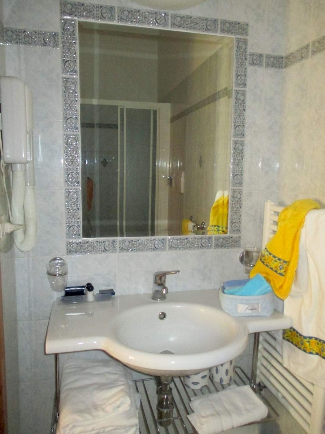 shower, free toiletries, hair dryer, slippers