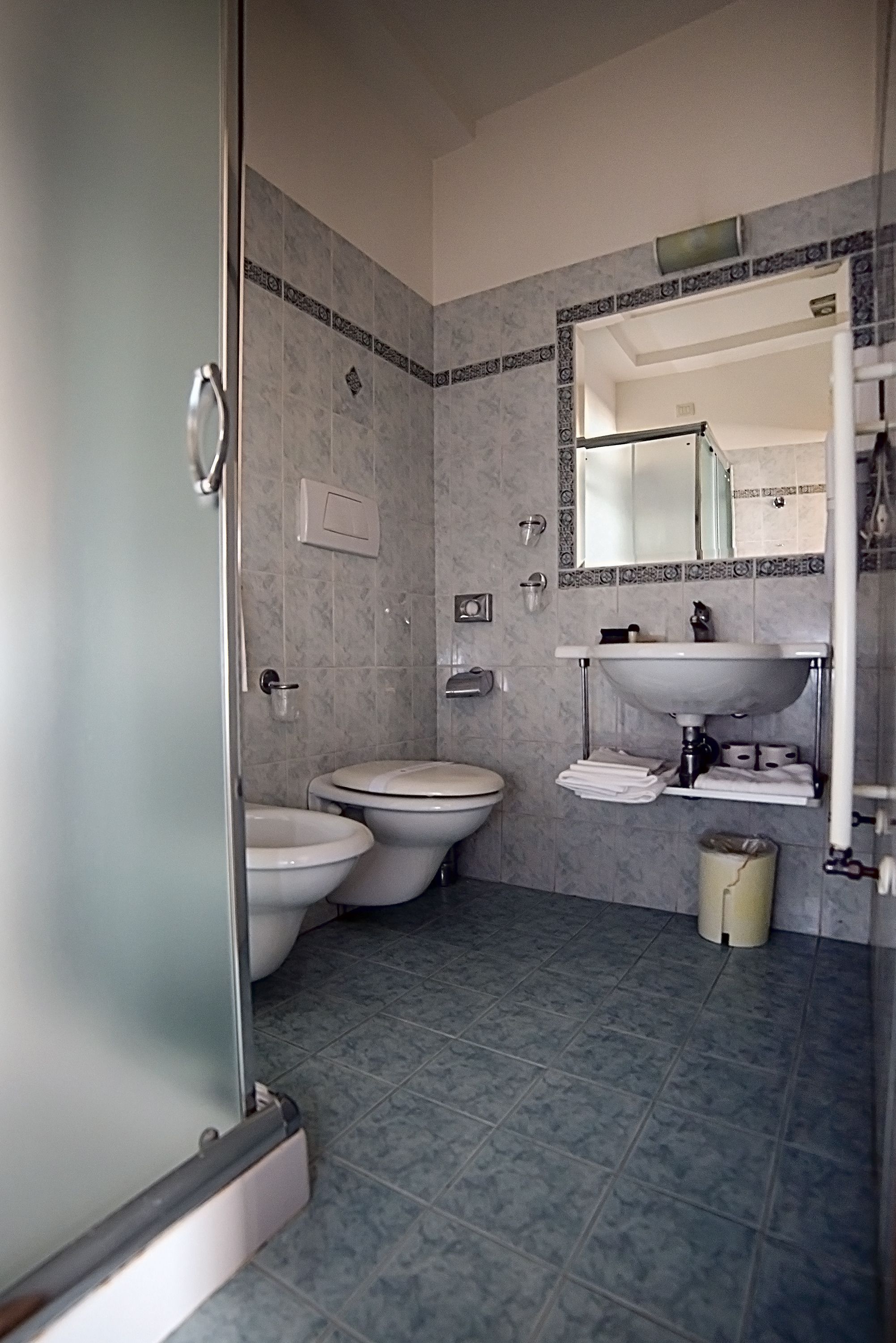 quadruple room | bathroom | shower, free toiletries, hair dryer, slippers