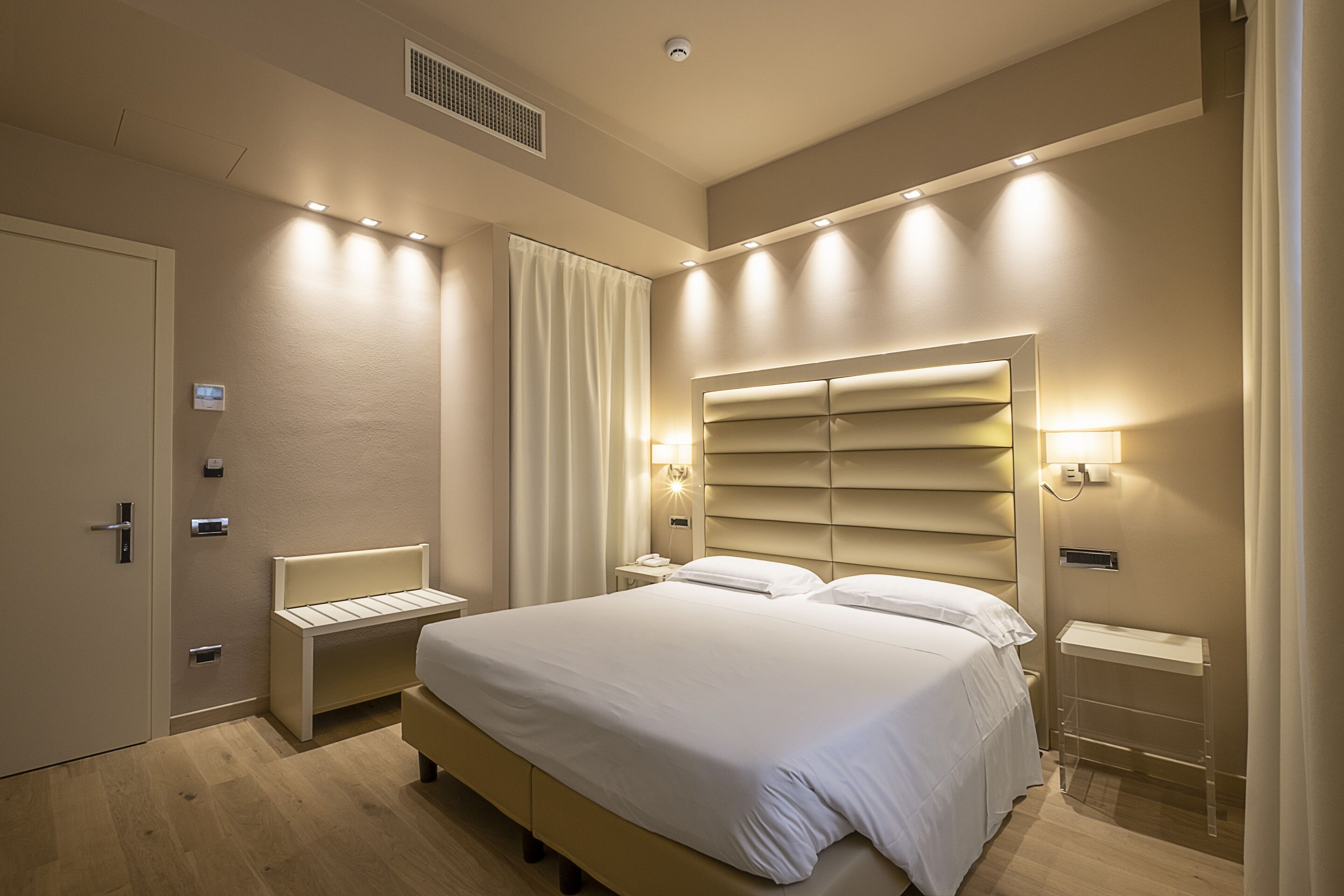 premium bedding, down duvets, minibar, in-room safe