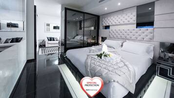 Suíte júnior, 1 cama King, para não fumantes (Living Room) | Edredons de pluma, frigobar, cofres nos quartos