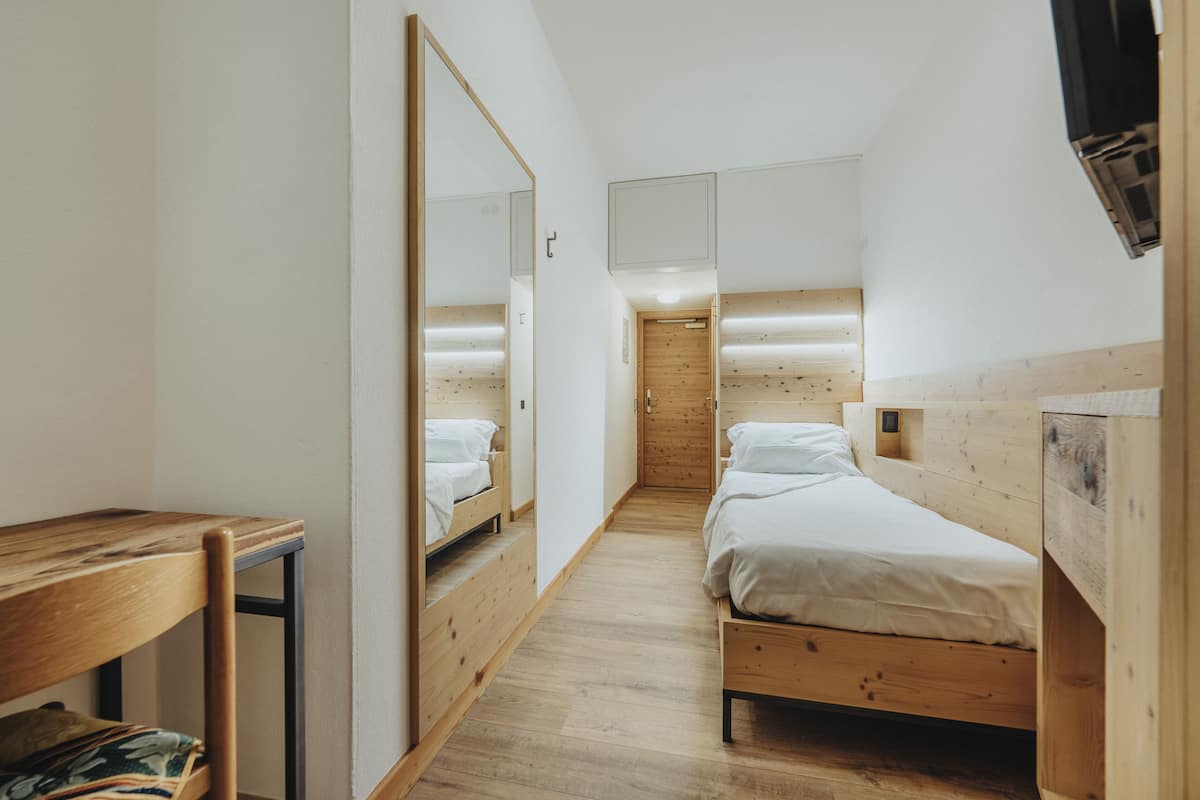 Singola Smart | Couette en duvet, coffre-fort, bureau, accĂšs au Wi-Fi (inclus)