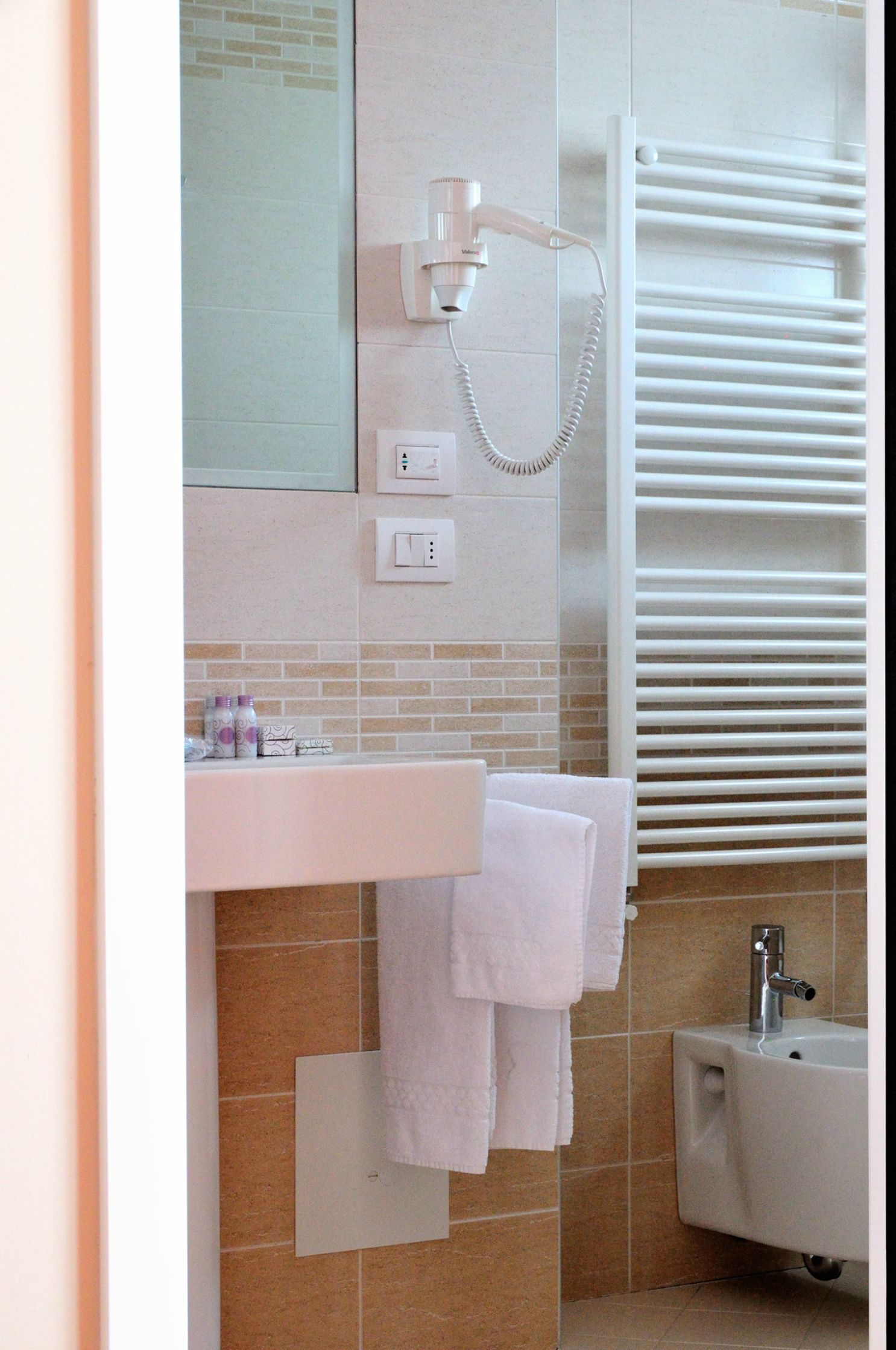 shower, free toiletries, hair dryer, slippers