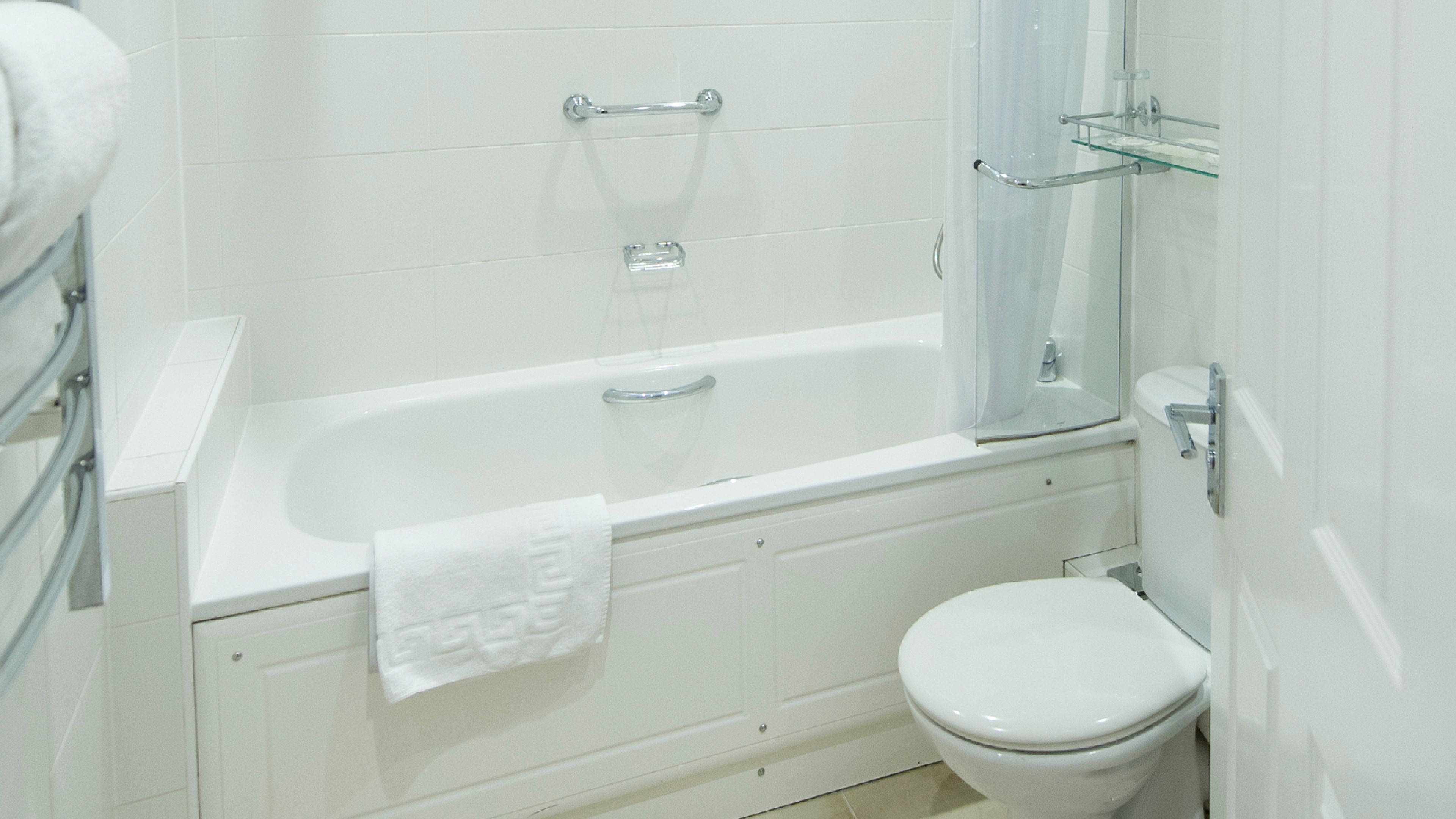 combined shower/bathtub, free toiletries, hair dryer, bathrobes