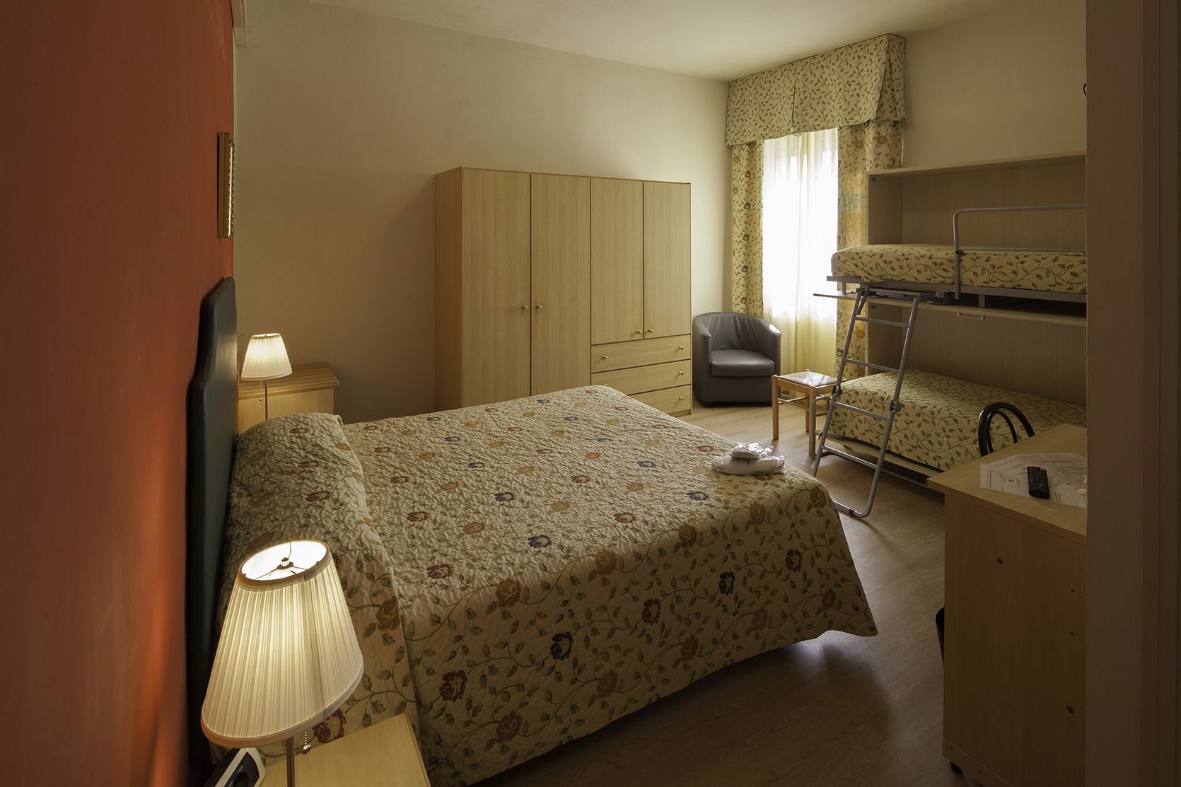 quadruple room | minibar, in-room safe, desk, rollaway beds