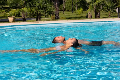 Indoor pool, 2 outdoor pools, pool umbrellas, sun loungers