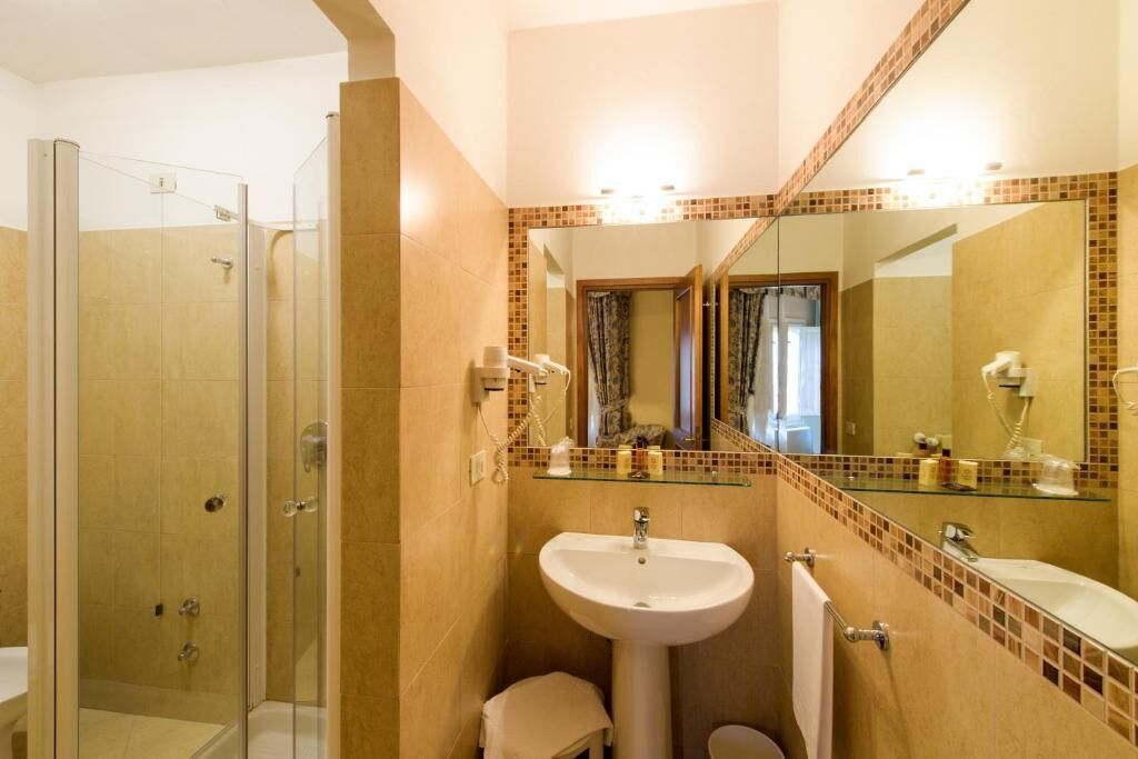 deep-soaking bathtub, rainfall showerhead, hair dryer, bidet